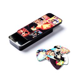 Dunlop JHPT08H Jimi Hendrix Montage Pick Tin  сувенирный набор мед-ров в пенале, жесткие, 12 шт.